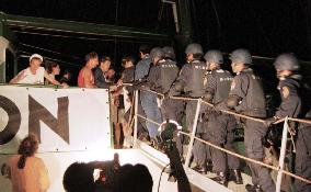Coast Guard officials inspect Greenpeace ship in Okinawa